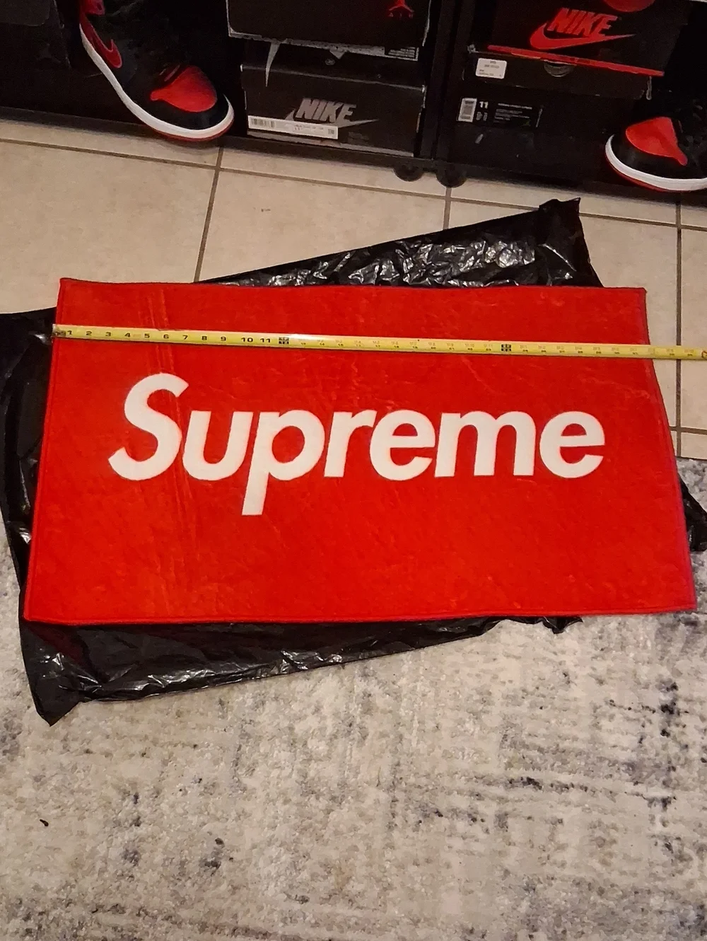 Supreme White Logo on Red Rug